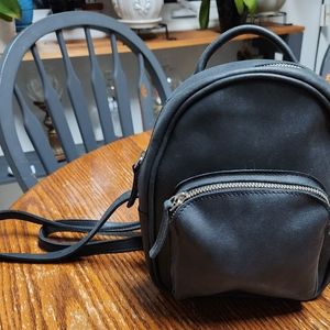 Roots backpack purse